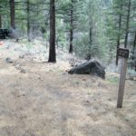 Sign that shows the top of the trail to the upper put-in