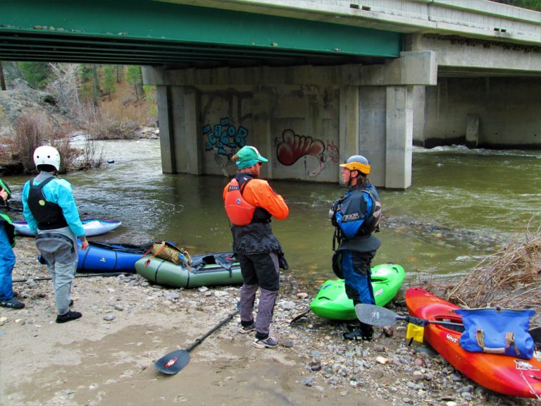 Packrafters and kayakers hanging out at hangman's bridge on the east fork of the carson river