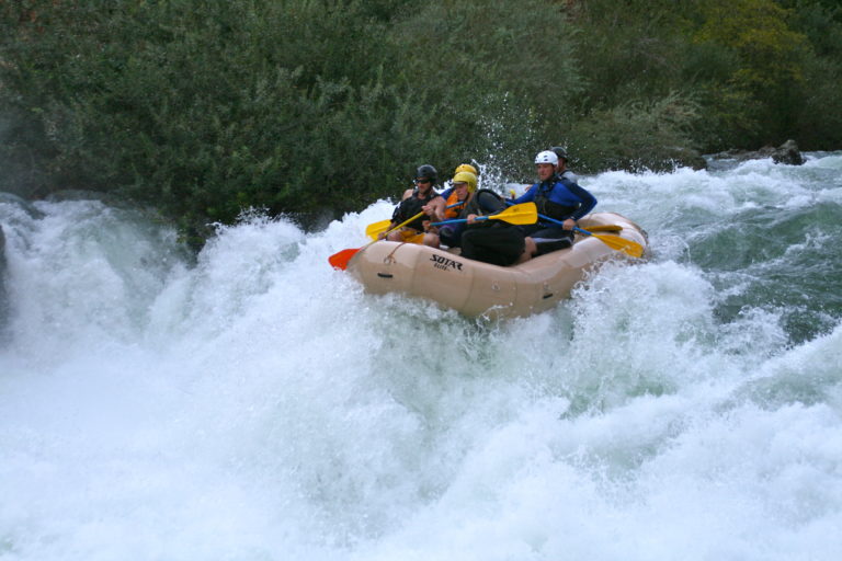 Stanislaus River Goodwin Canyon paddle raft in the middle of Matterhorn rapid