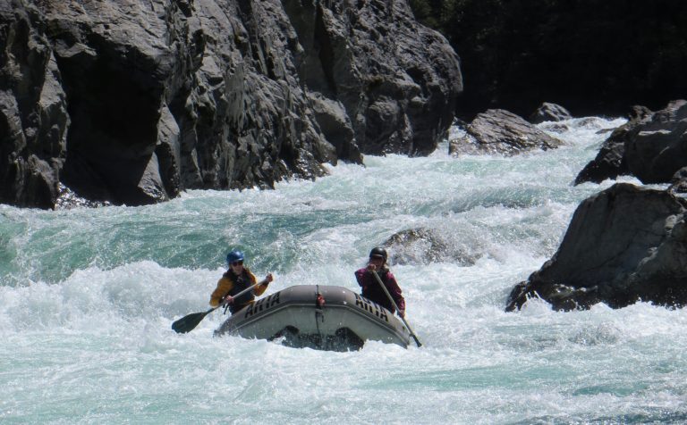 two rafters in Greenwall Rapid on the Illinois River