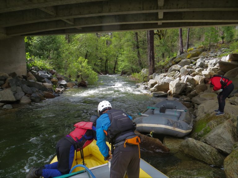 pumping up rafts at put-in