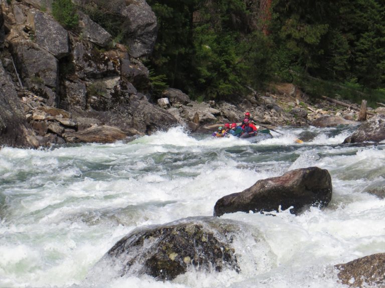 raft entering Wolf Creek Rapid