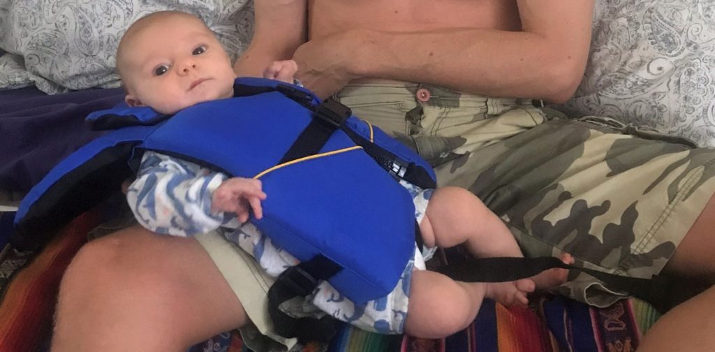 how the Stohlquist Infant Life jacket covers baby's thighs