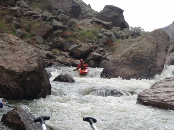 kayaker runing main drop on Wally's Wallow rapid