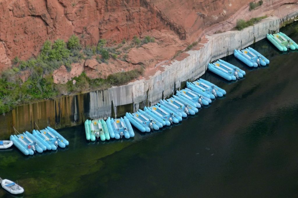 motorized rafts tied up on Colorado River