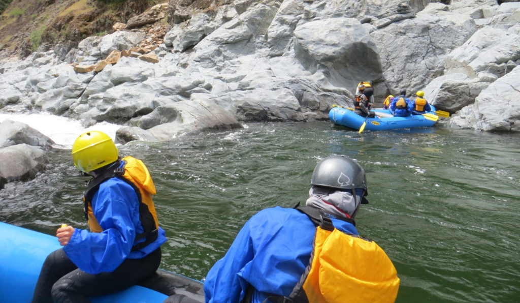 rafts stopping to scout rapid