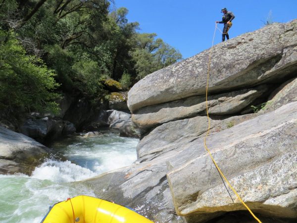 show how to line a raft through the first class v+ rapid on the North Fork Tuolumne
